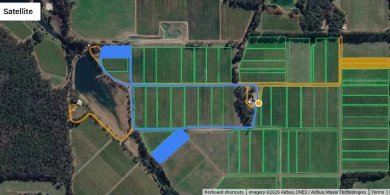 Tractor routes drawn over the vineyard blocks on a satellite map
